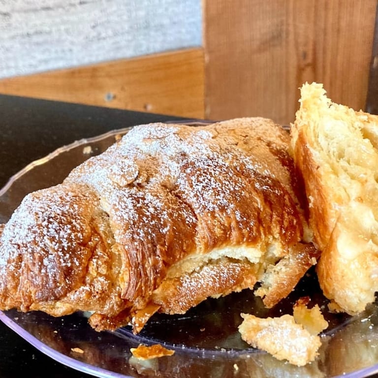 Indulge in our almond croissant